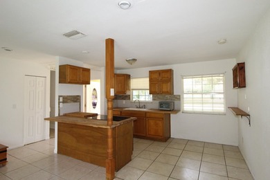 Charming 3-bedroom, 2-bath home with converted garage for extra - photo 2