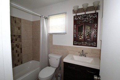 Charming 3-bedroom, 2-bath home with converted garage for extra - photo 9
