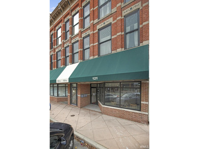 Large Main St building with 2 Store fronts on Main St in Elkhart - photo 2