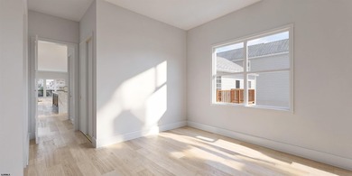Welcome to 9612 Monmouth Avenue, a stunning brand-new coastal - photo 9