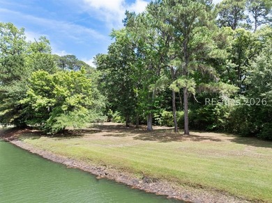 Nestled within the prestigious community of Long Cove Club, this - photo 3