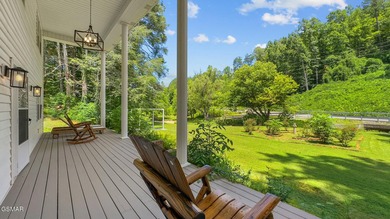 This well-known iconic white farmhouse sits proudly in the heart - photo 5