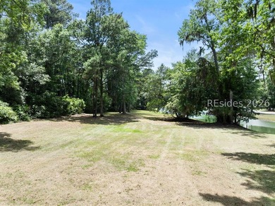Nestled within the prestigious community of Long Cove Club, this - photo 5