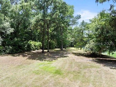 Nestled within the prestigious community of Long Cove Club, this - photo 6