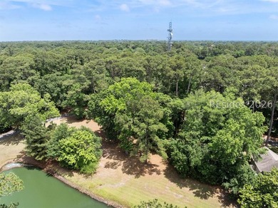 Nestled within the prestigious community of Long Cove Club, this - photo 8