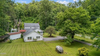 This well-known iconic white farmhouse sits proudly in the heart - photo 9