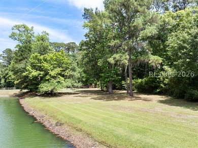 Nestled within the prestigious community of Long Cove Club, this - photo 9