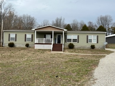PENDING! Spacious 4 bed 2 bath home across from the lake! SOLD - Lake Home SOLD! in McDaniels, Kentucky