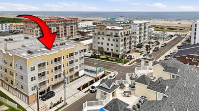 Welcome to this exceptional top-floor condominium in desirable - photo 1