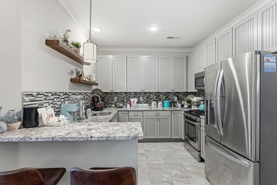 Welcome to this exceptional top-floor condominium in desirable - photo 5