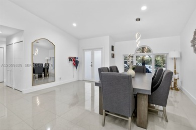 Step into a beautifully remodeled Hollywood estate where style - photo 6