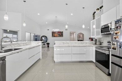Step into a beautifully remodeled Hollywood estate where style - photo 8