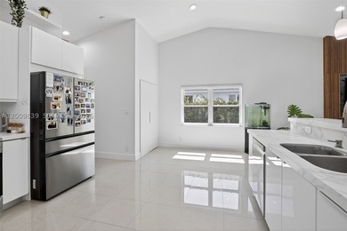 Step into a beautifully remodeled Hollywood estate where style - photo 9