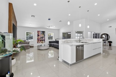 Step into a beautifully remodeled Hollywood estate where style - photo 10