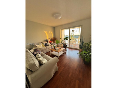 Third-floor apartment located in the community of Doral Isles - - photo 11