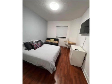 Third-floor apartment located in the community of Doral Isles - - photo 12