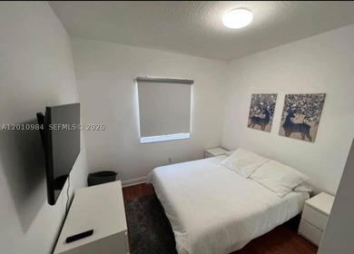 Third-floor apartment located in the community of Doral Isles - - photo 13