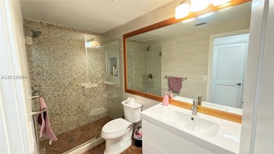 Third-floor apartment located in the community of Doral Isles - - photo 18