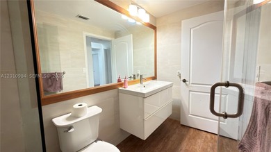 Third-floor apartment located in the community of Doral Isles - - photo 19
