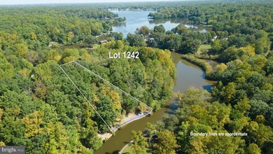 Waterfront lot with dock in Blue Ridge Shores: Nestled within - photo 5
