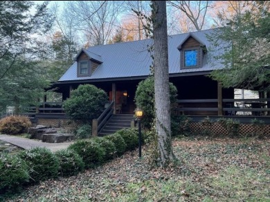 WATERFRONT CUSTOM LOG HOME ON WOLF RIVER NEAR DALE HOLLOW LAKE - Lake Home For Sale in Byrdstown, Tennessee