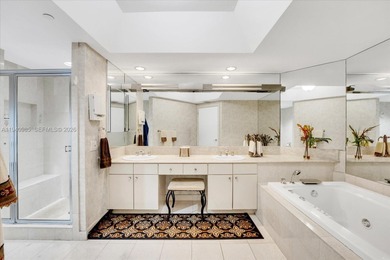 An elegant 3-bedroom residence in the prestigious, gated enclave