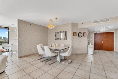 An elegant 3-bedroom residence in the prestigious, gated enclave