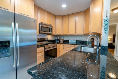 Nicely updated 2 bedroom, 1 1/2 bathroom ground floor condo is a - photo 2
