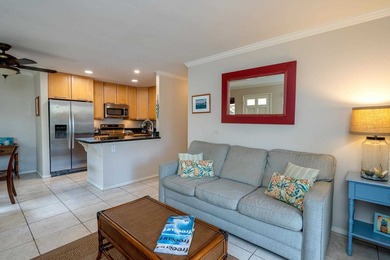 Nicely updated 2 bedroom, 1 1/2 bathroom ground floor condo is a - photo 3