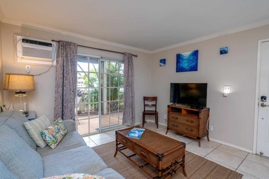 Nicely updated 2 bedroom, 1 1/2 bathroom ground floor condo is a - photo 4