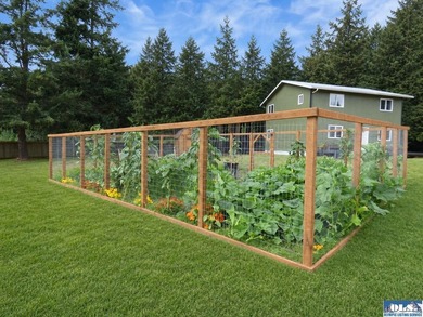 Tucked among mature trees and lovingly maintained, this inviting - photo 19