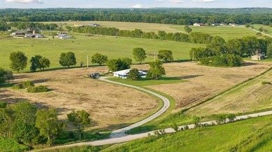 Discover peaceful country living just minutes from Lake Hudson - photo 26