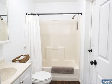 Tucked among mature trees and lovingly maintained, this inviting - photo 39