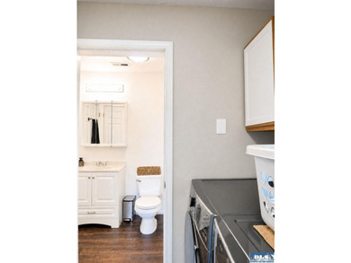 Tucked among mature trees and lovingly maintained, this inviting - photo 41