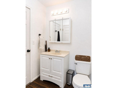 Tucked among mature trees and lovingly maintained, this inviting - photo 42