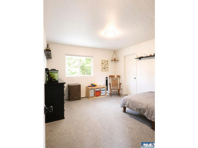 Tucked among mature trees and lovingly maintained, this inviting - photo 49