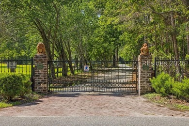 Tucked behind wrought iron gates on over four private, fenced - photo 5