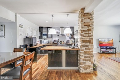 This charming split foyer home features an open floor plan with - photo 5