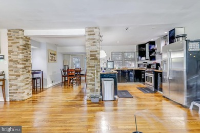 This charming split foyer home features an open floor plan with - photo 6