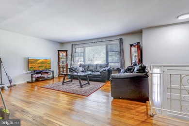 This charming split foyer home features an open floor plan with - photo 8