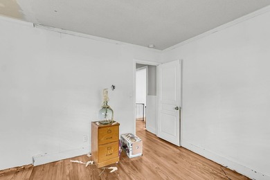 Unlock the potential of this 3-bedroom, 2-bathroom property - photo 8