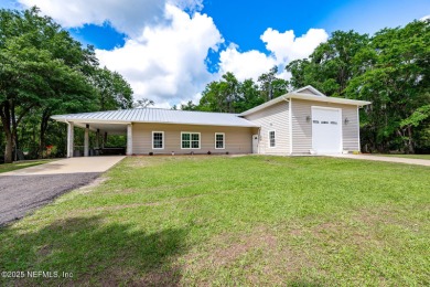 Lake Home For Sale in Waldo, Florida