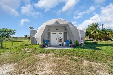 This unique 2-bedroom, 2.5 bathrooms dome-style home sits on a - photo 1