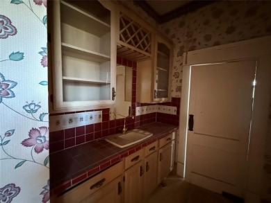 An American Four Square home built in 1911 exudes timeless charm