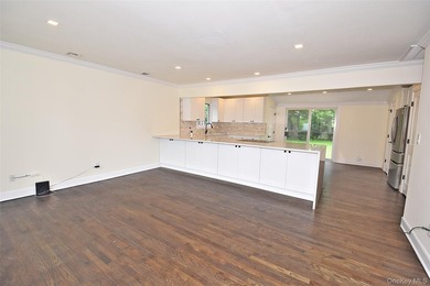 The stunning brand-new eat-in kitchen is the heart of the home - photo 6