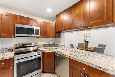 Welcome to this beautifully updated 2 bedroom, 2 bathroom top - photo 9