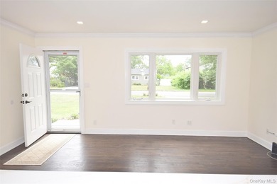 The stunning brand-new eat-in kitchen is the heart of the home - photo 10