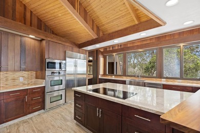 This 10 acre Piiholo property at 4,000' elevation borders a - photo 4