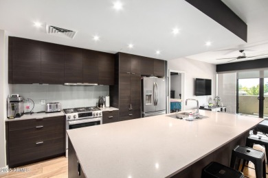 5 DEEDED garage parking spaces & 1 EV charging station & Largest