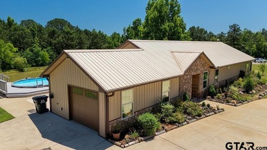 Custom steel-frame home with guest quarters, shop, pool, pond & - photo 1